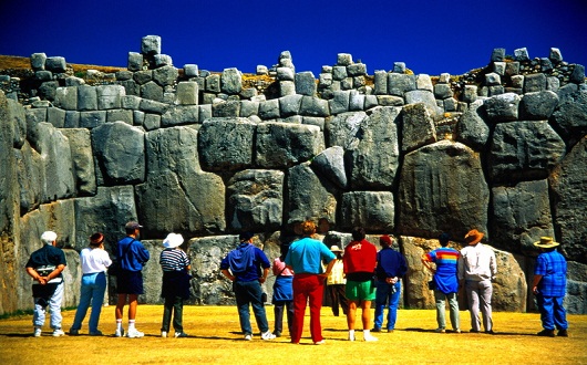 Peru, near Cuzco, Sacsayhuaman Inca Ruins, tourists visiting ruins