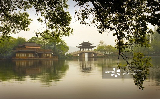 A stone bridge at West Lake in Hangzhou, China